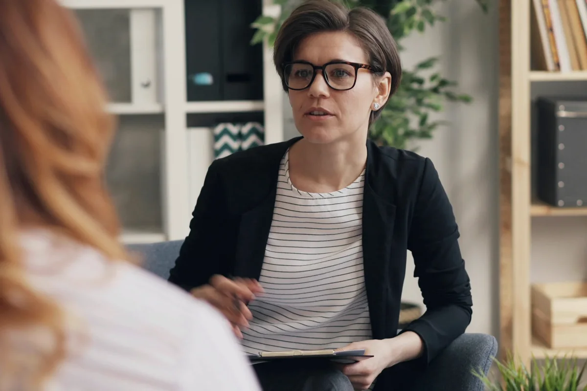 Psychologist and client discussing whether ADHD may explain longstanding difficulties